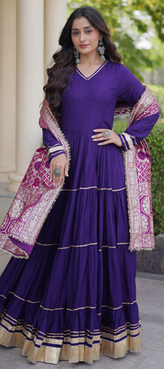 Purple and Violet color Gown in Rayon fabric with Lace work