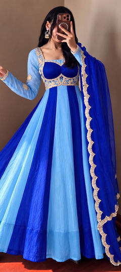 Blue color Gown in Tissue fabric with Embroidered work