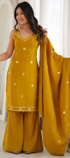 Yellow color Salwar Kameez in Roman Silk fabric with Foil Print, Mirror work