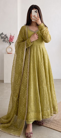 Green color Salwar Kameez in Silk fabric with Mirror, Weaving work