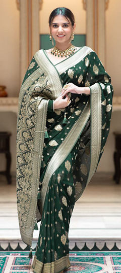 Green color Saree in Georgette fabric with Weaving work
