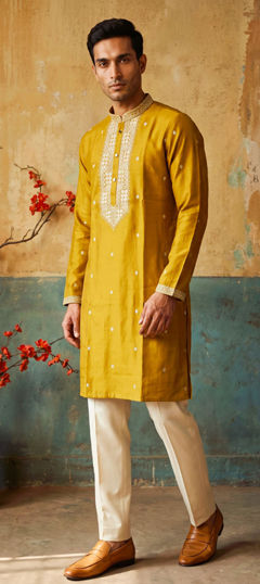 Yellow color Kurta Pyjamas in Roman Silk fabric with Embroidered work