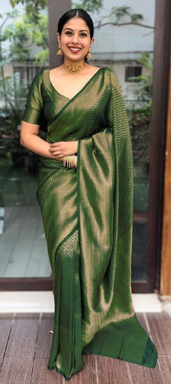 Green color Saree in Silk fabric with Weaving work