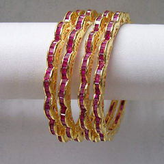 Gold Rodium Polish Gold, Pink and Majenta color Bangles in Metal Alloy studded with CZ Diamond