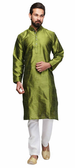 Green color Kurta Pyjamas in Raw Dupion Silk fabric with Stone work