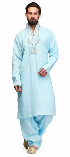 Blue color Kurta Pyjamas in Raw Dupion Silk fabric with Stone work