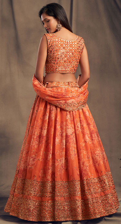 Gorgeous orange color bridal lehenga and blouse with dupatta. Lehenga and  blouse with signature silver threa… | Orange lehnga, Bridal lehenga images,  Lehenga images