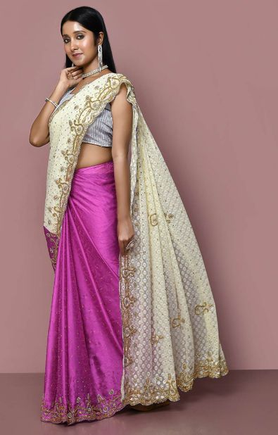 In a elegant pink color saree, gold color collar & sleeveless blouse design  and jewelry | Saree dress, Saree styles, Saree blouse designs