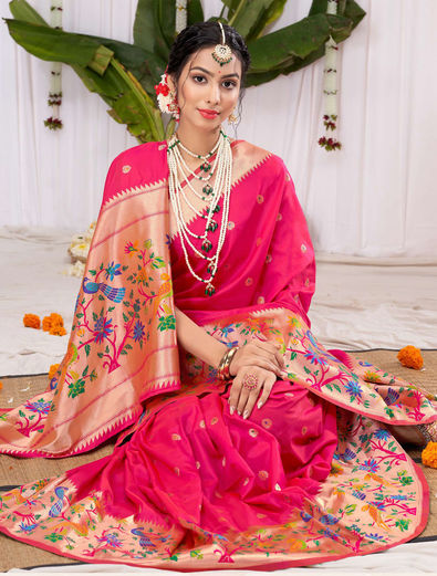 Close up of an Indian Bengali teenage girl wearing pink saree and red blouse  with golden color earrings, bangles and dark hair holding sari over head  Stock Photo - Alamy