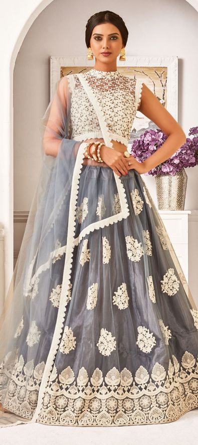 STEEL GREY SILVER LEHENGA SET WITH ALL OVER SILVER AND GOLD LACE EMBROIDERY  PAIRED WITH A MATCHING DUPATTA AND ALL OVER SILVER AND GOLD EMBELLISHMENTS.  - Seasons India