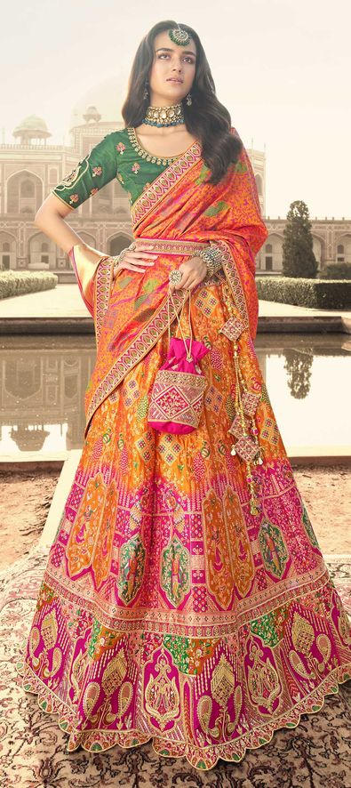 Bride In Orange Bridal Lehenga - Shaadiwish