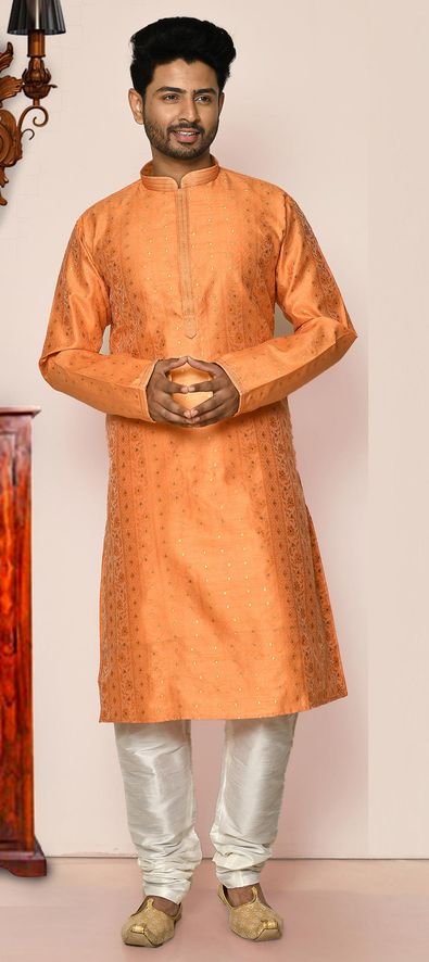 Brocade Kurta Pyjamas in Orange with Weaving work