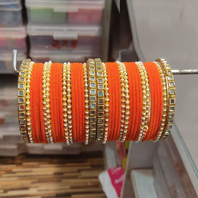 Orange metal deals bangles