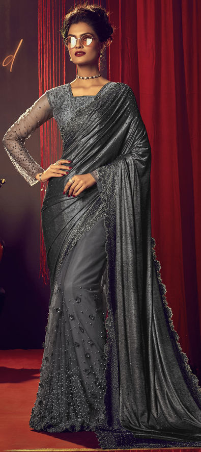 Black cotton silk with silver zari borders and buttas saree