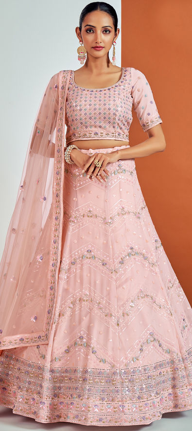 Beautiful Pink colored Heavy embroidered Lehenga Set - Rent