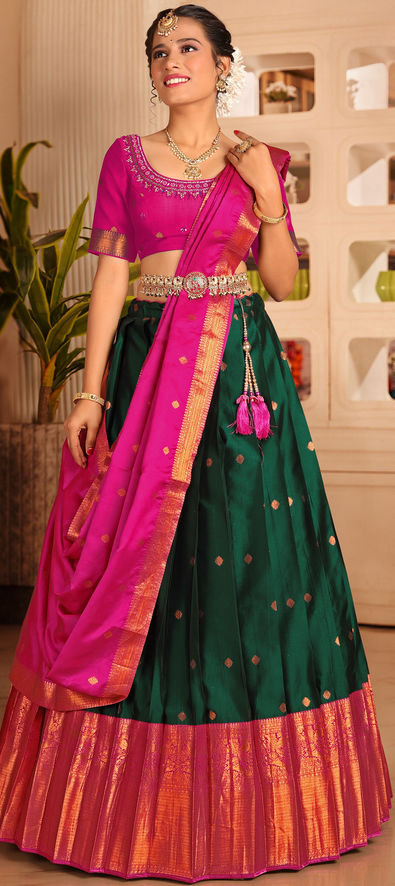 Woven Zari Banarasi silk lehenga choli in Green and Pink